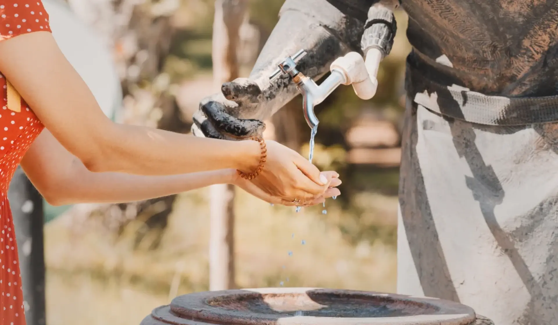 The Water Carrier Sculpture