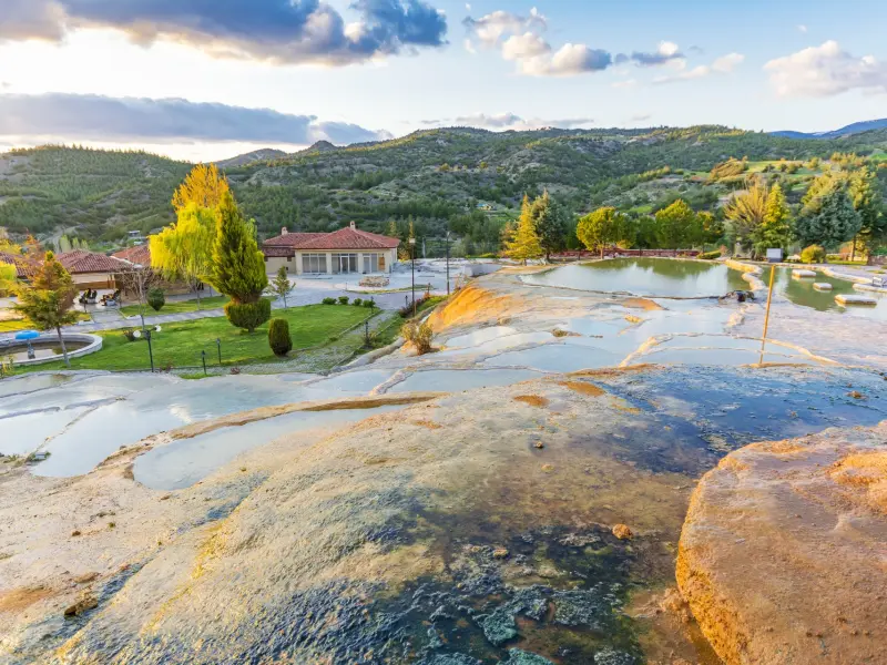 Karahayit Village in Pamukkale, Turkey - thermal springs and red travertines