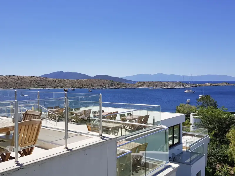 Bitez Beach in Bodrum, Turkey - shore, water entry, and infrastructure