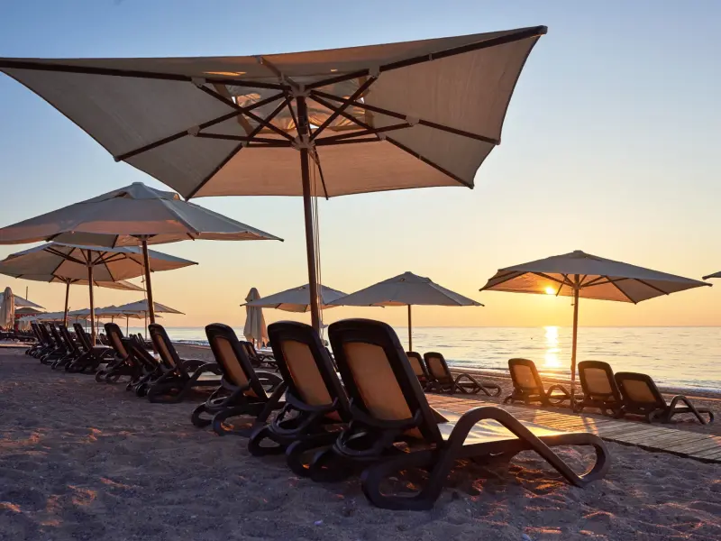 Tekirova Beach in Kemer, Turkey with a pebble shore and mountain views